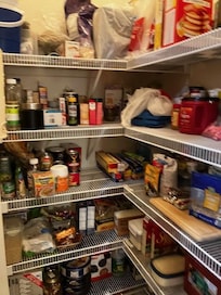The pantry is so full of food I could not put my things in.