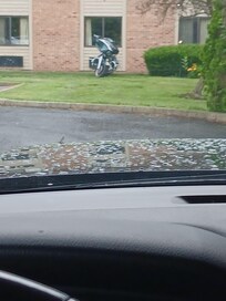 parking on the lawn in the front of the building