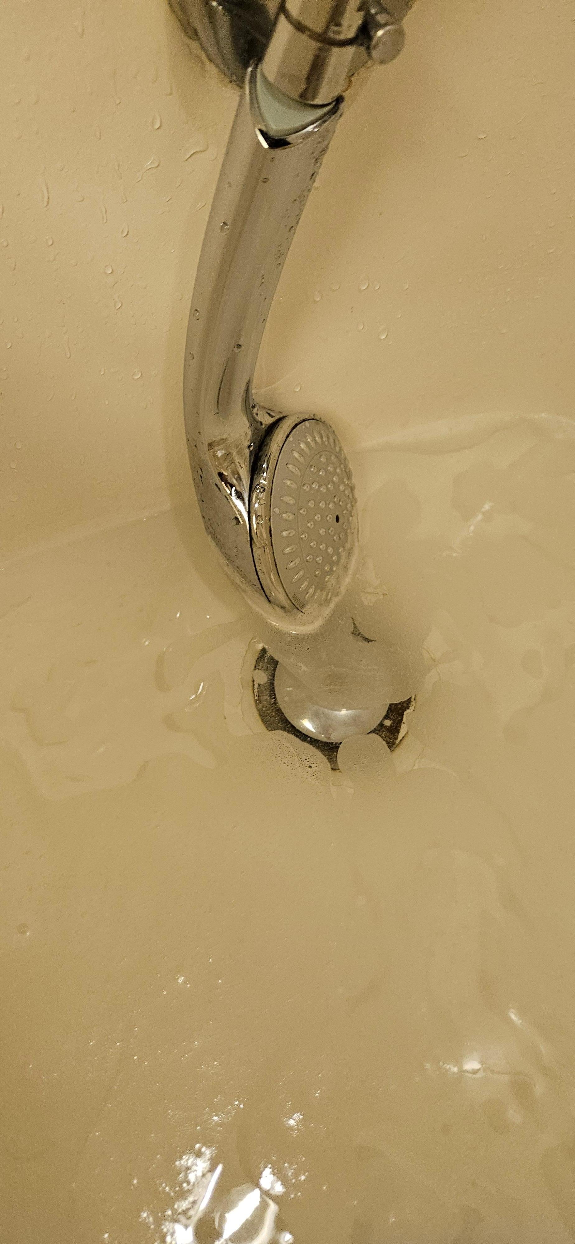 Water does not drain well - up to ankle high during shower