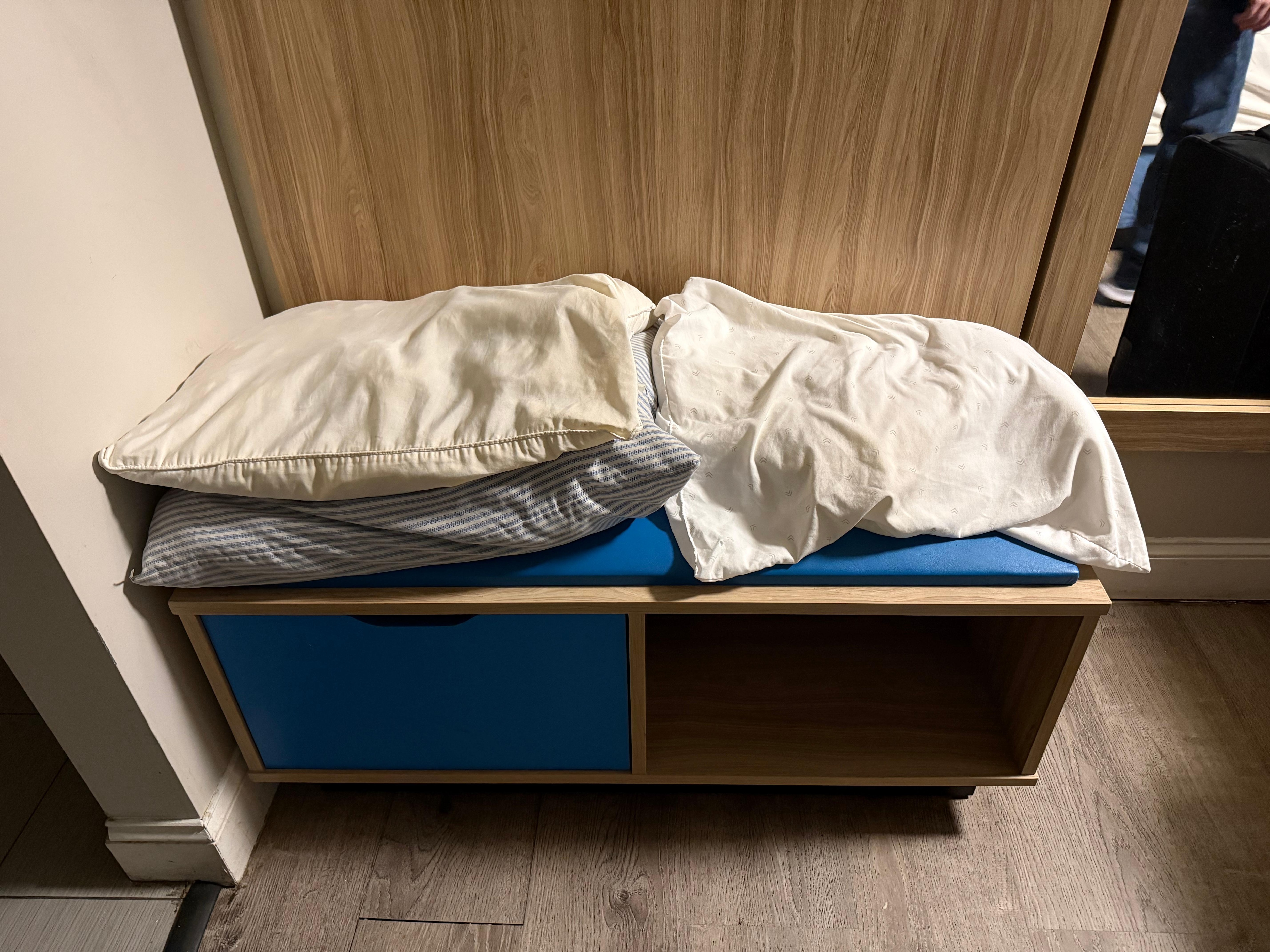 Pillows were thin, ragged and stained