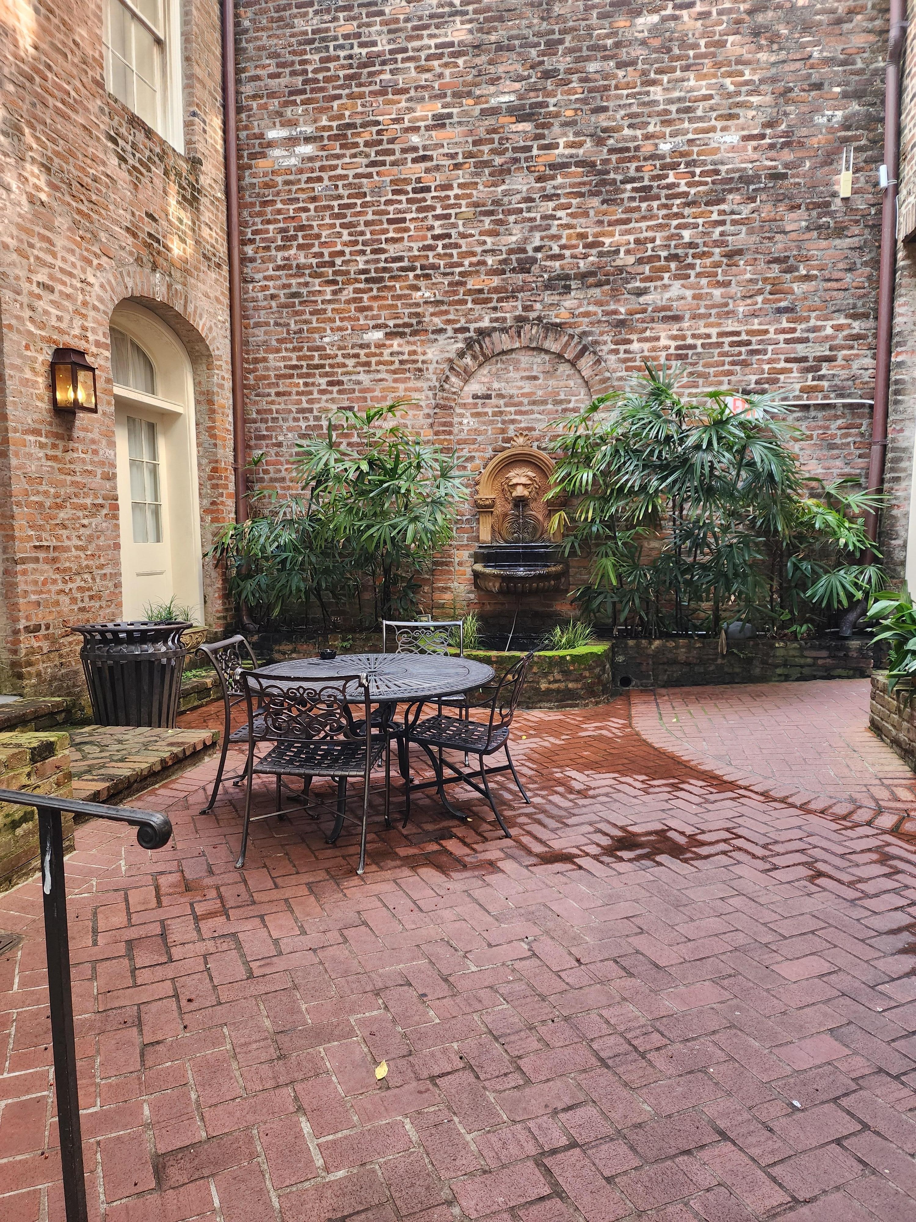 Court yard, there is a small pool at the other end