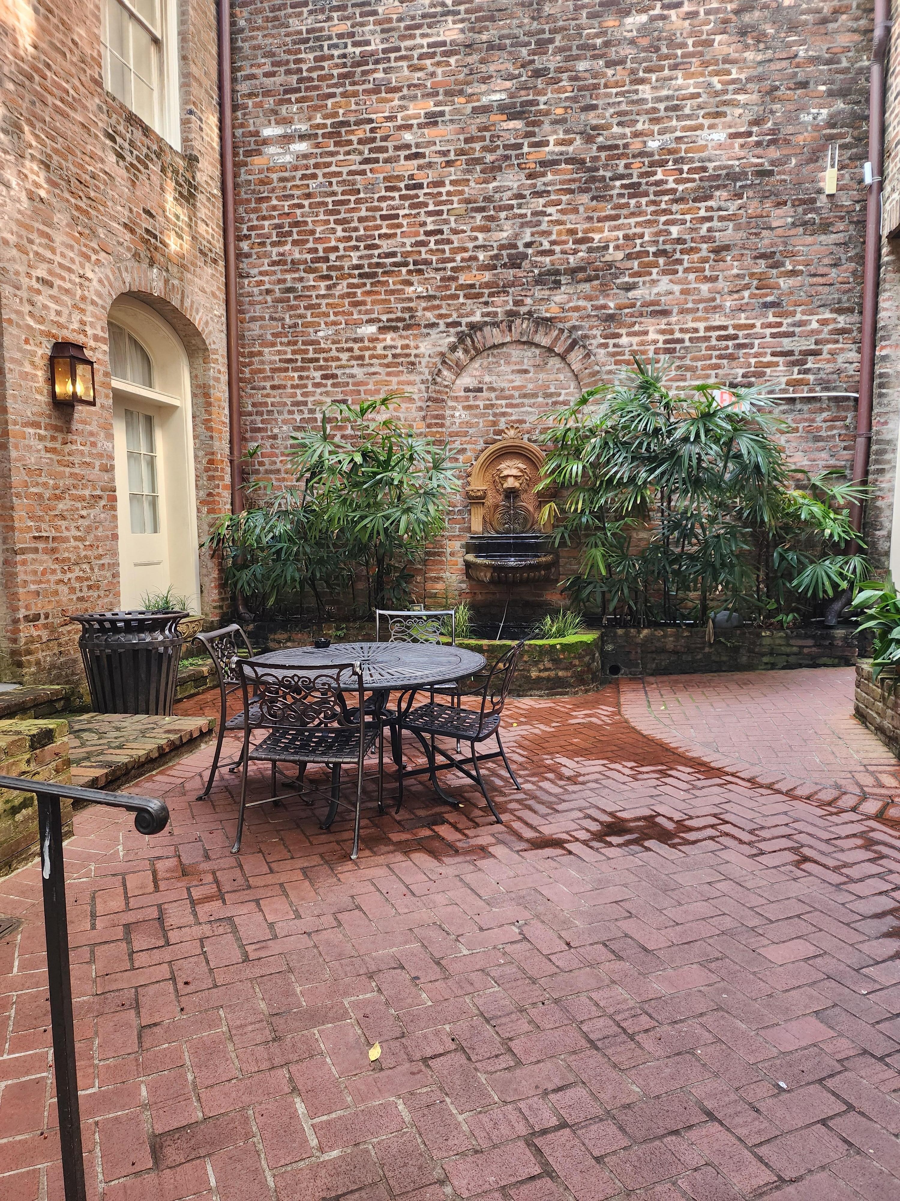 Court yard, there is a small pool at the other end