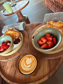 Crossanwich breakfast, with a flat white