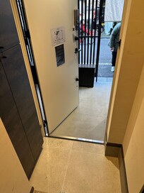 Our room 1 with door open and views of the public street