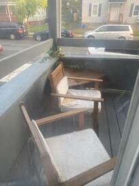 Ripped chairs on the porch. Dirty.