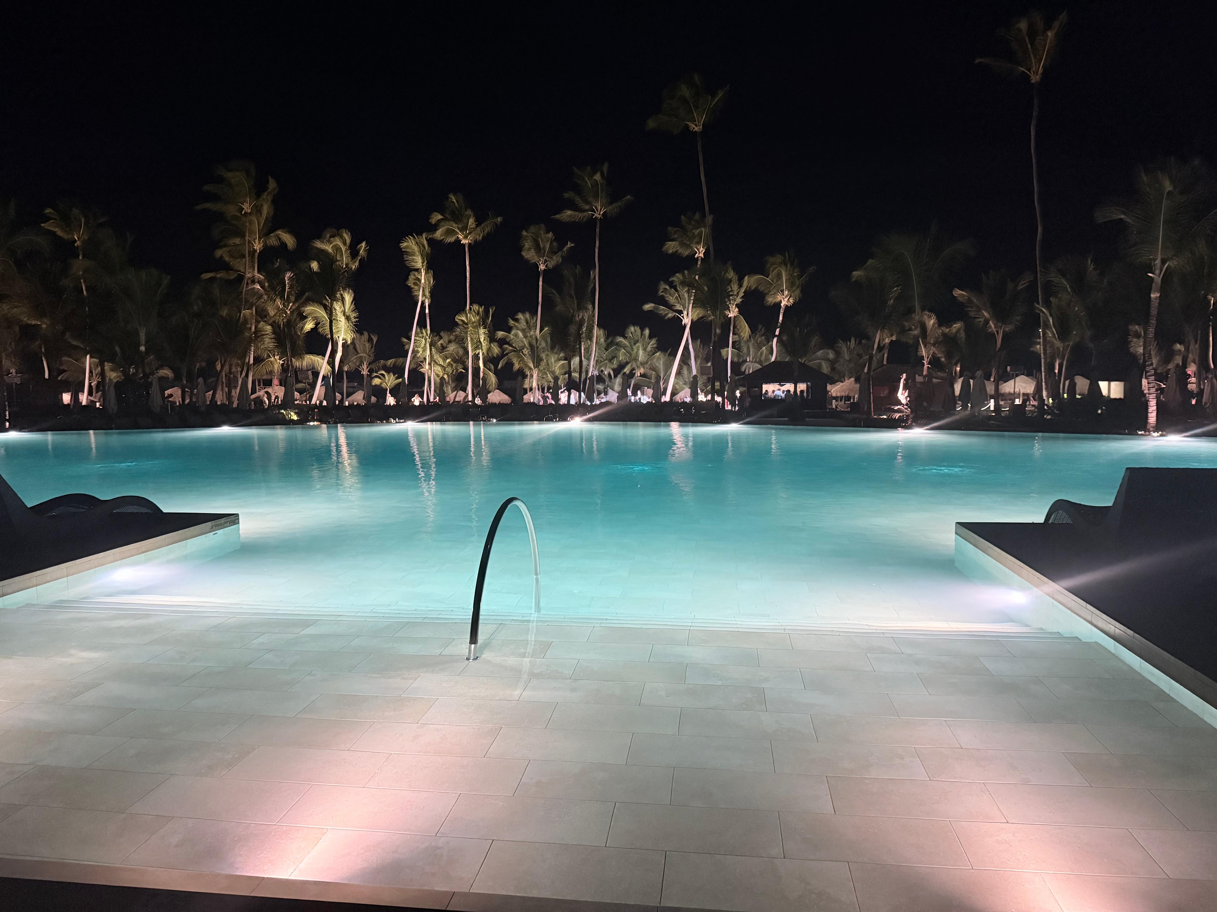 The pool looks amazing at night 
