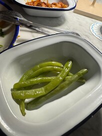 The “green beans and almonds” side from the Mediterranean restaurant