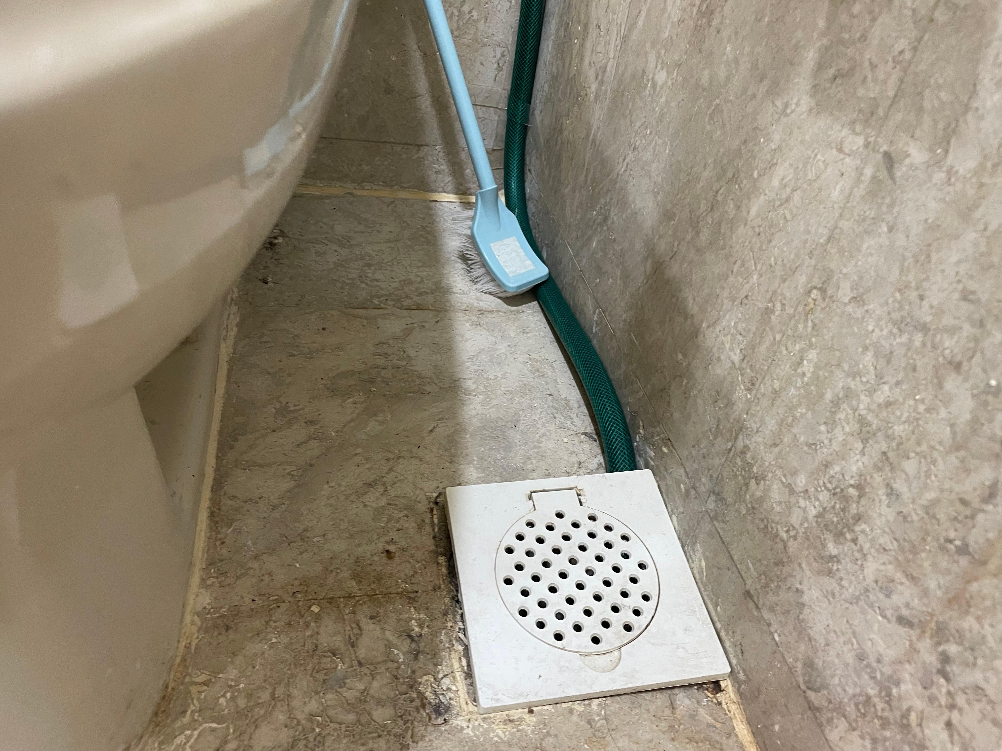 A hose was used as drainage and there’s a bad odour in the toilet.