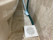 A hose was used as drainage and there’s a bad odour in the toilet.