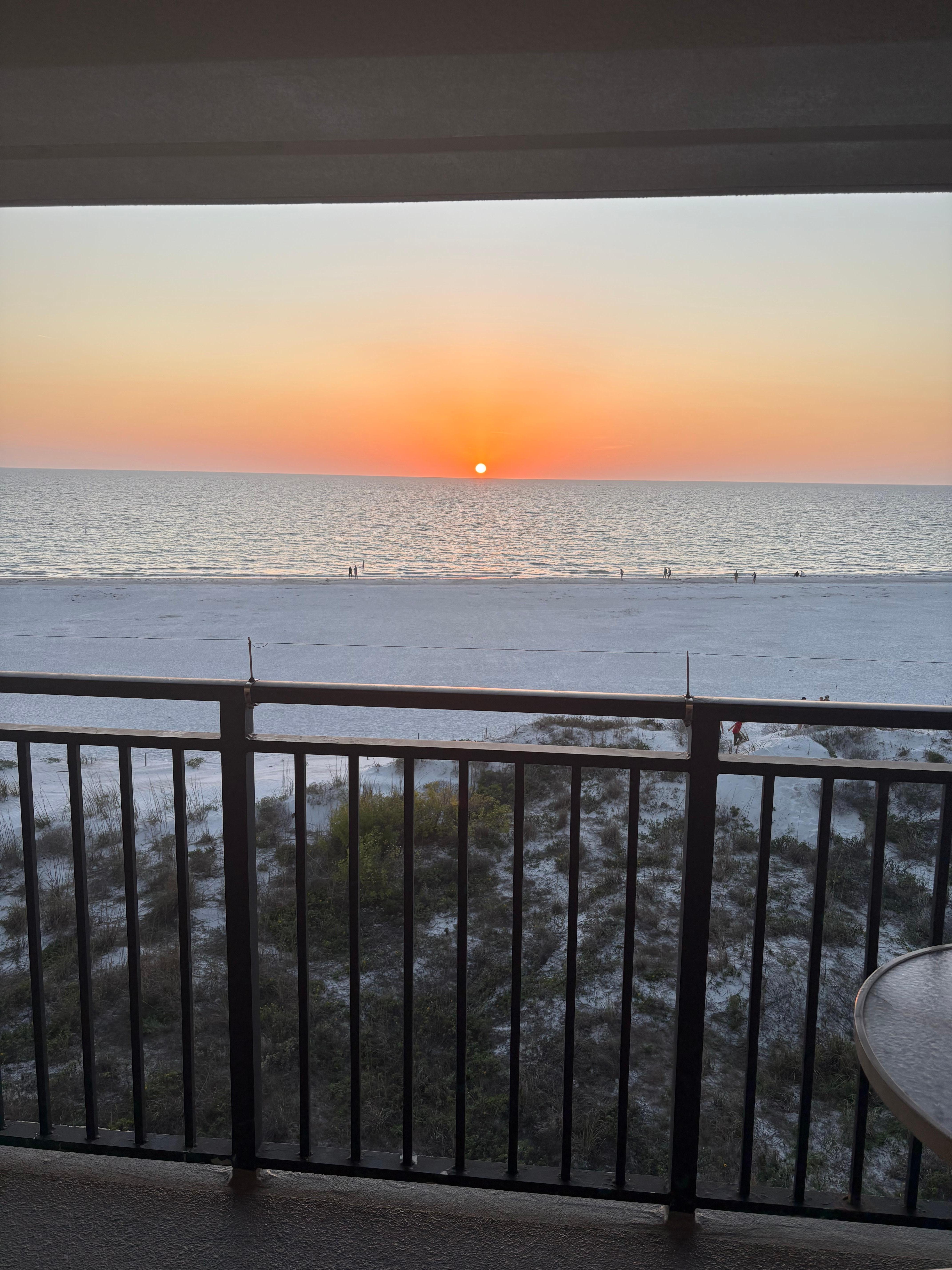 View of setting sun from balcony