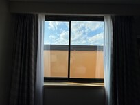 I was in room 314, this was our view during our stay. At least we had clouds to look at, with the occasional plane that flew by during takeoff or landing.