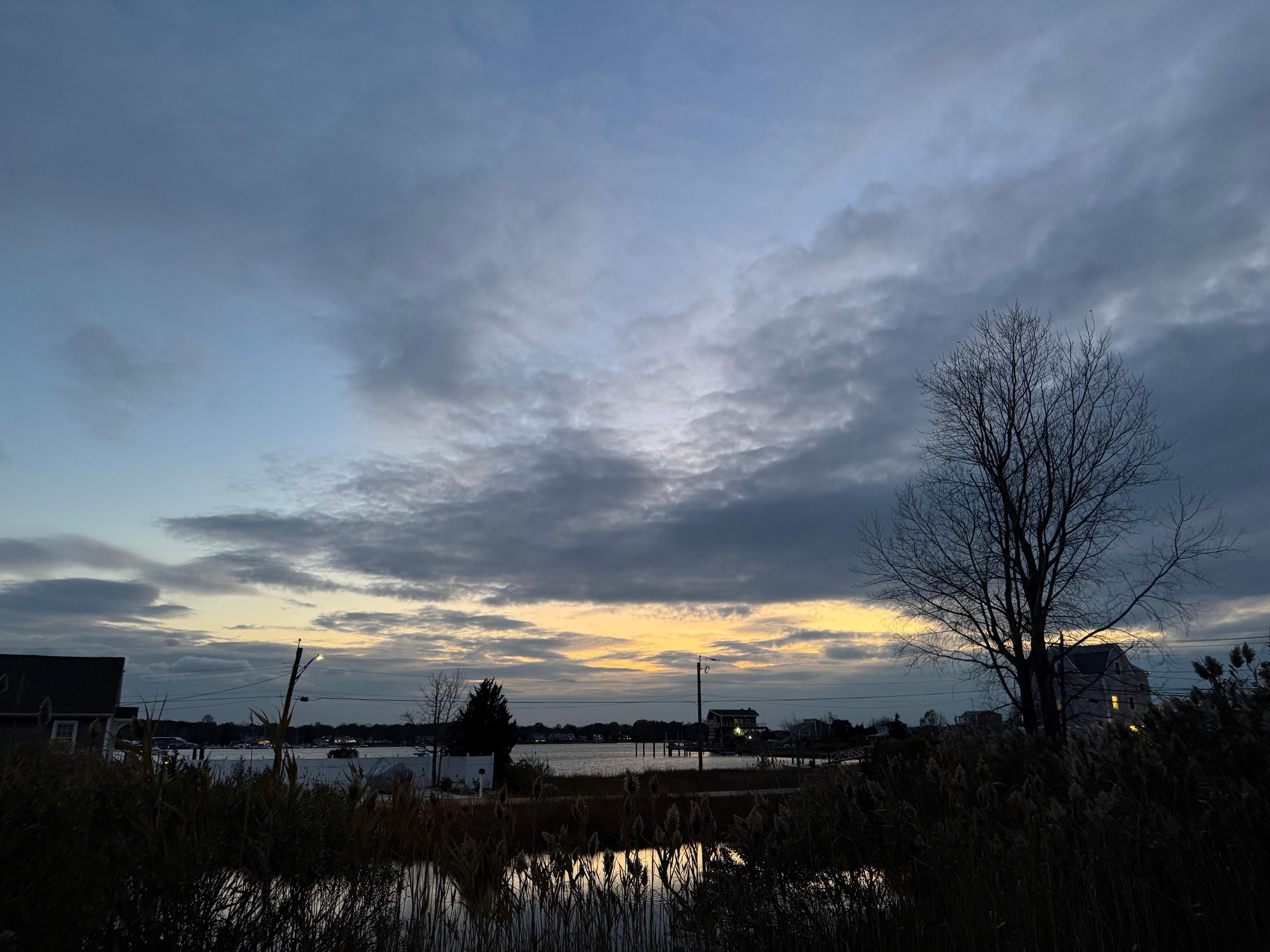 The kitchen window view at sunset. 