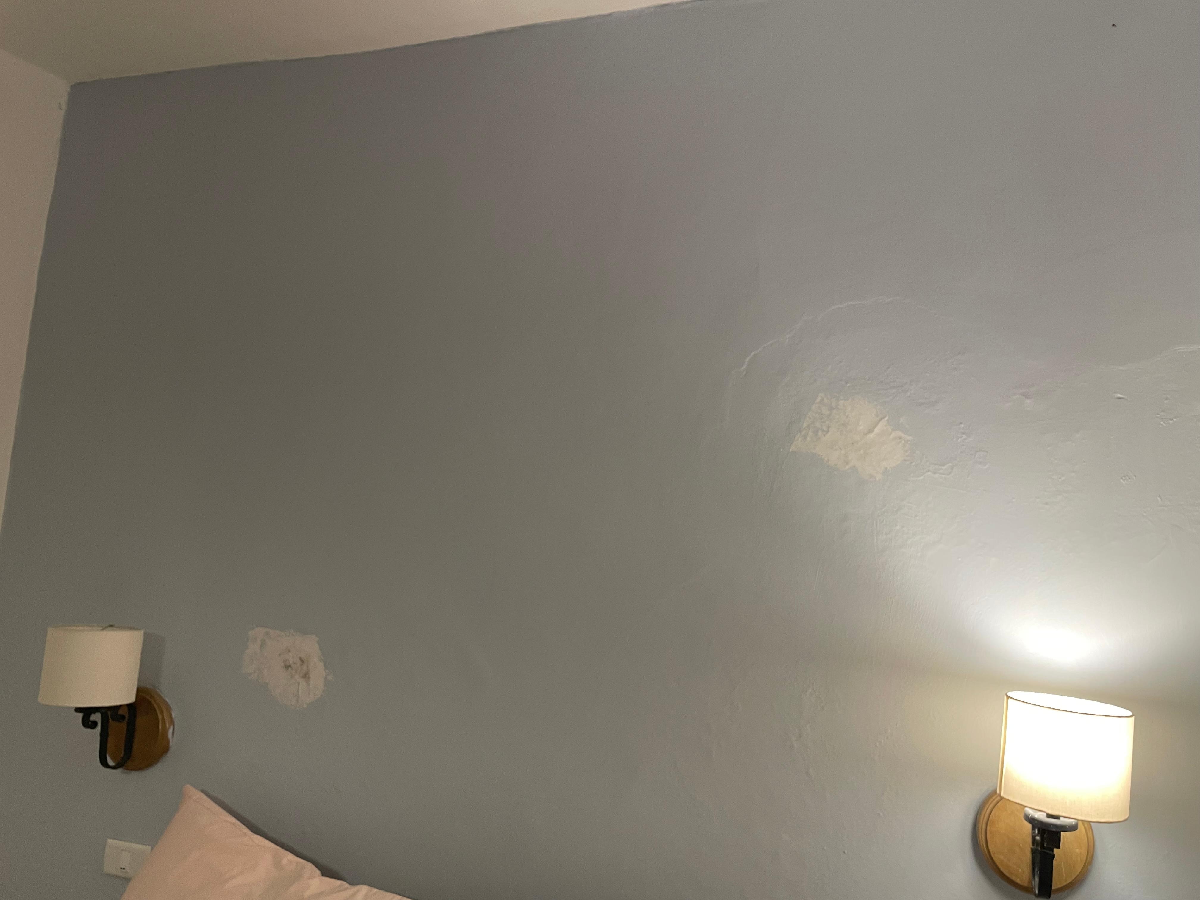 Initially thought those were clouds in a light blue sky. Nope! Just barren walls with paint peeling off.