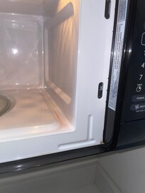 Poorly cleaned microwave. Proof that it was not cleaned