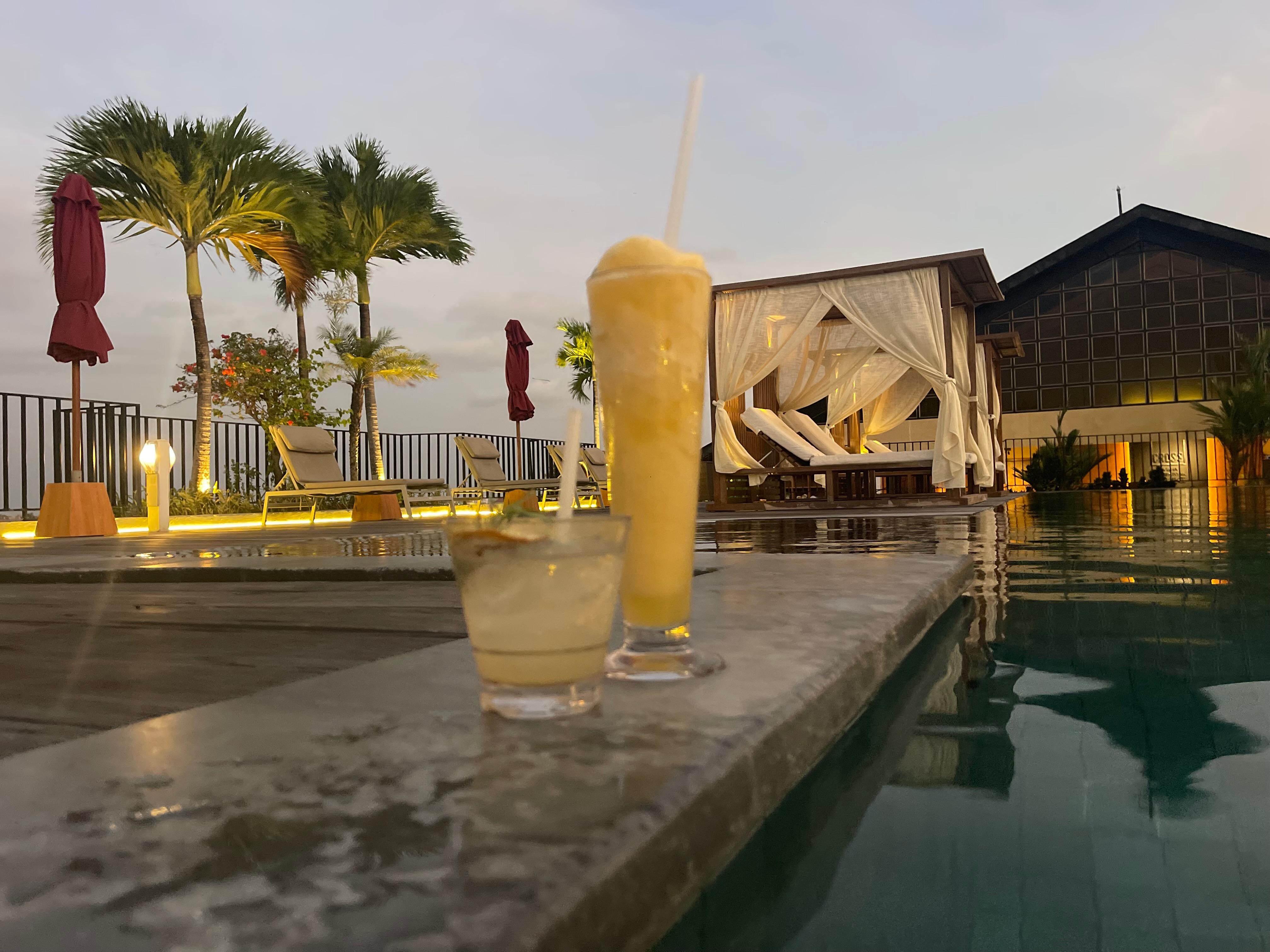 Enjoying a drink and snacks by the pool. 