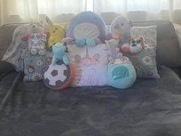 Pull out couch With lots of stuffies from the boardwalk!