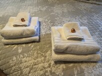 Fresh towels and chocolates on the bed!