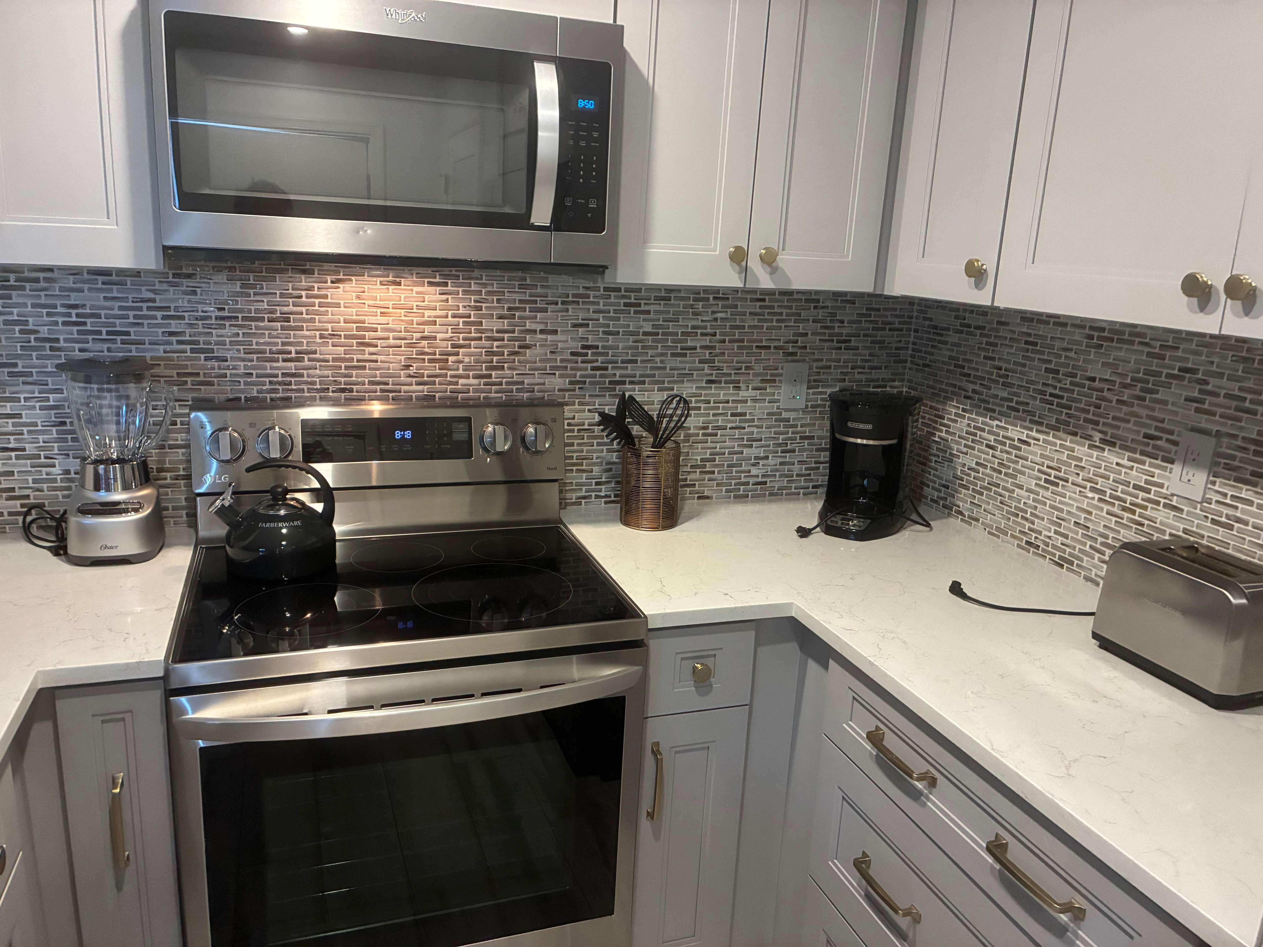 Kitchen is the best part - clean and well stocked equipment appliances and supplies