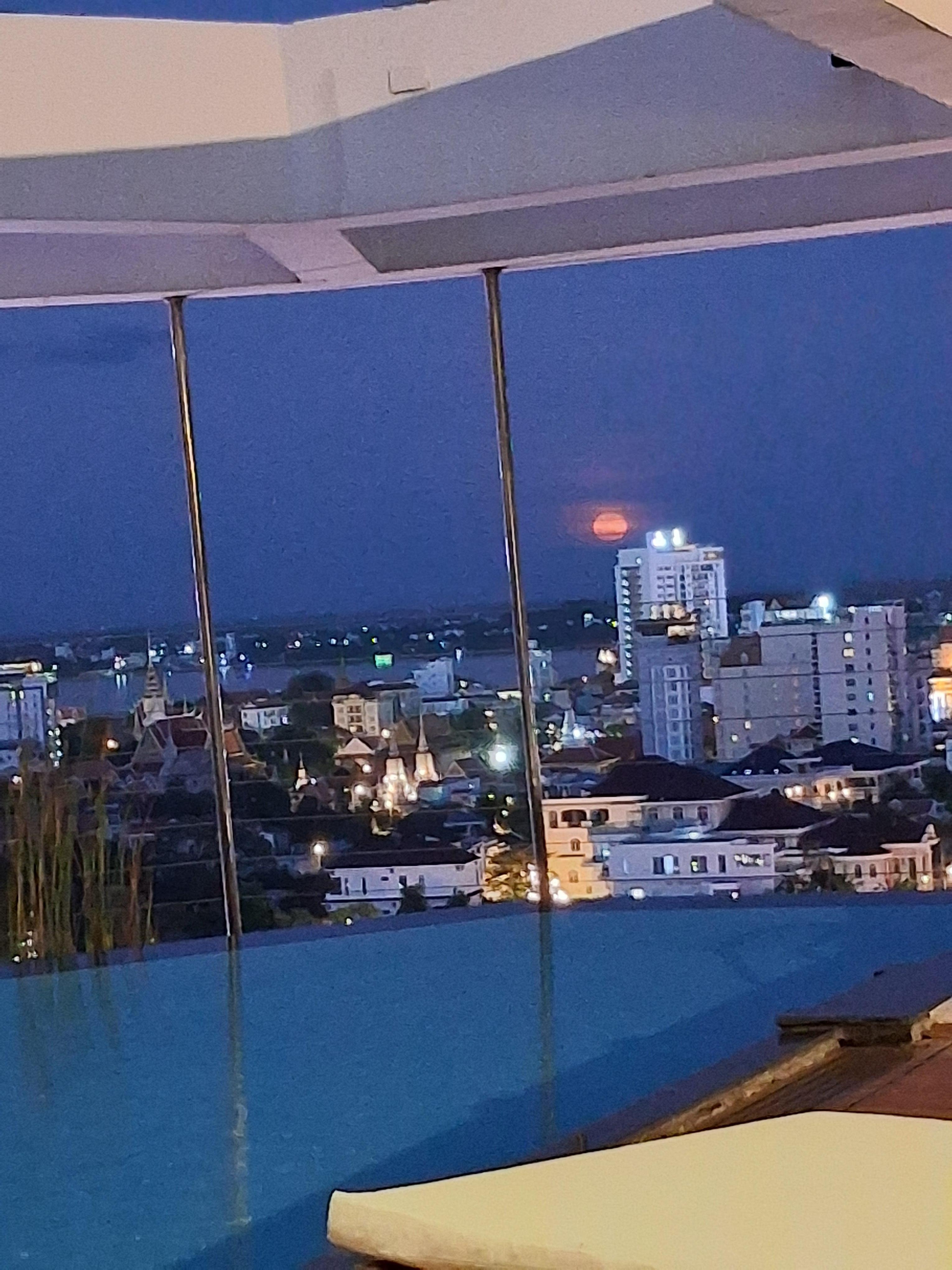 Evening view from rooftop pool.