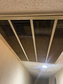 Air conditioner vent in hallway, dirty air filter