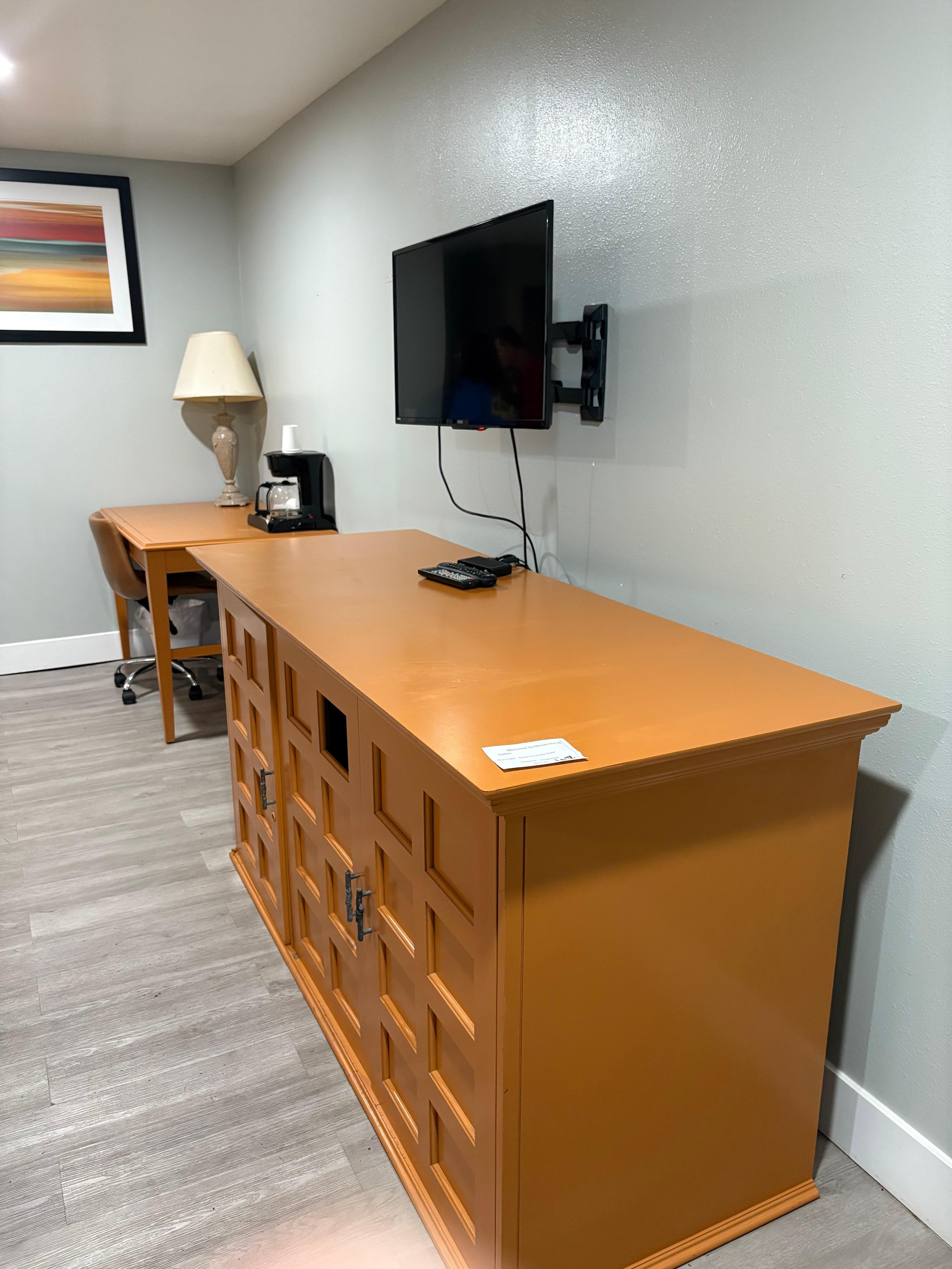 Tiniest TV over the biggest dresser