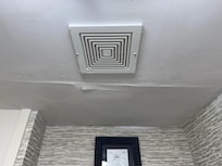 Water damage in bathroom ceiling