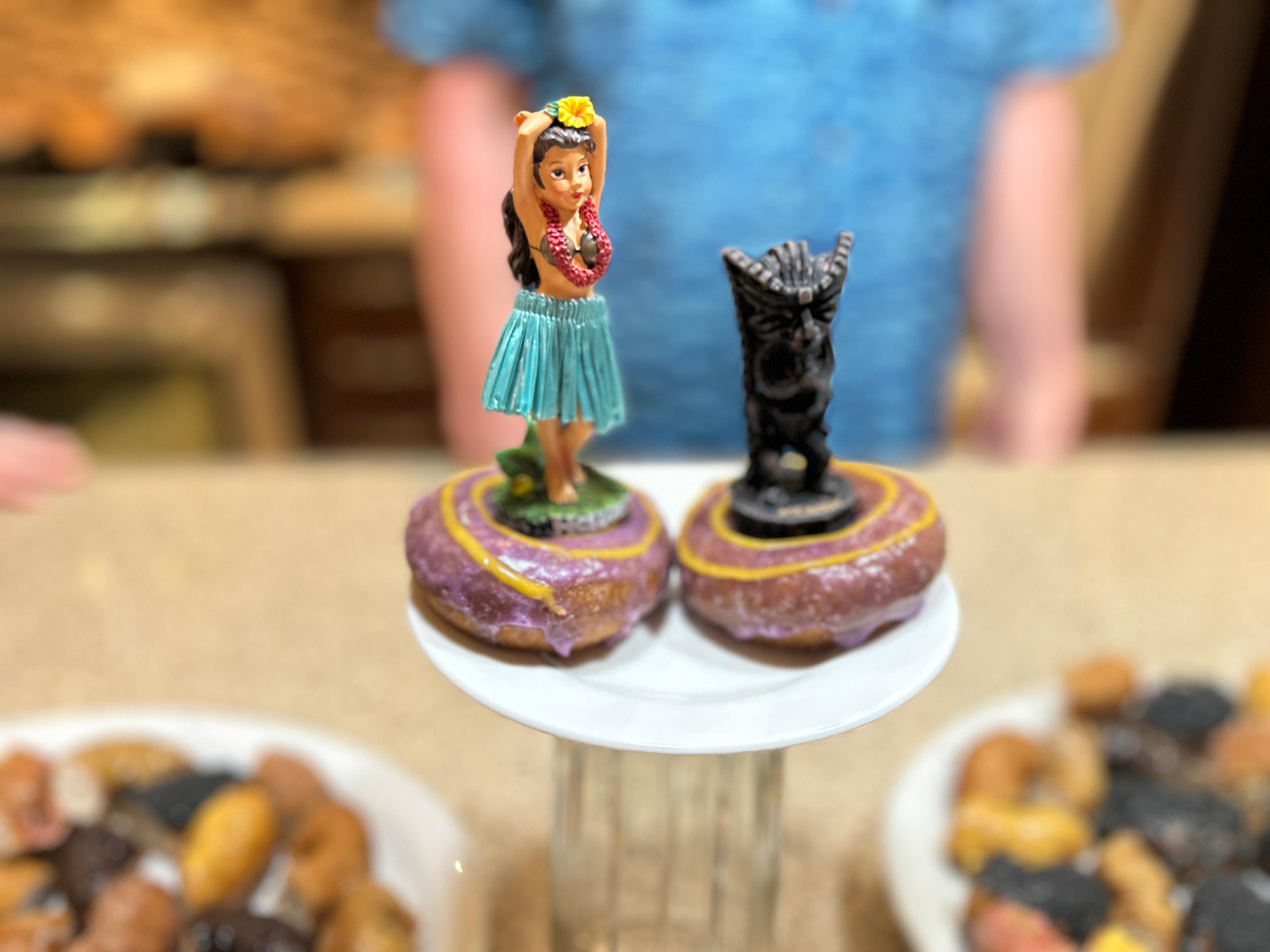 The bride and groom had Holey Grail donuts for their "cake" and we used a hula girl and tiki guy for the "wedding cake toppers".