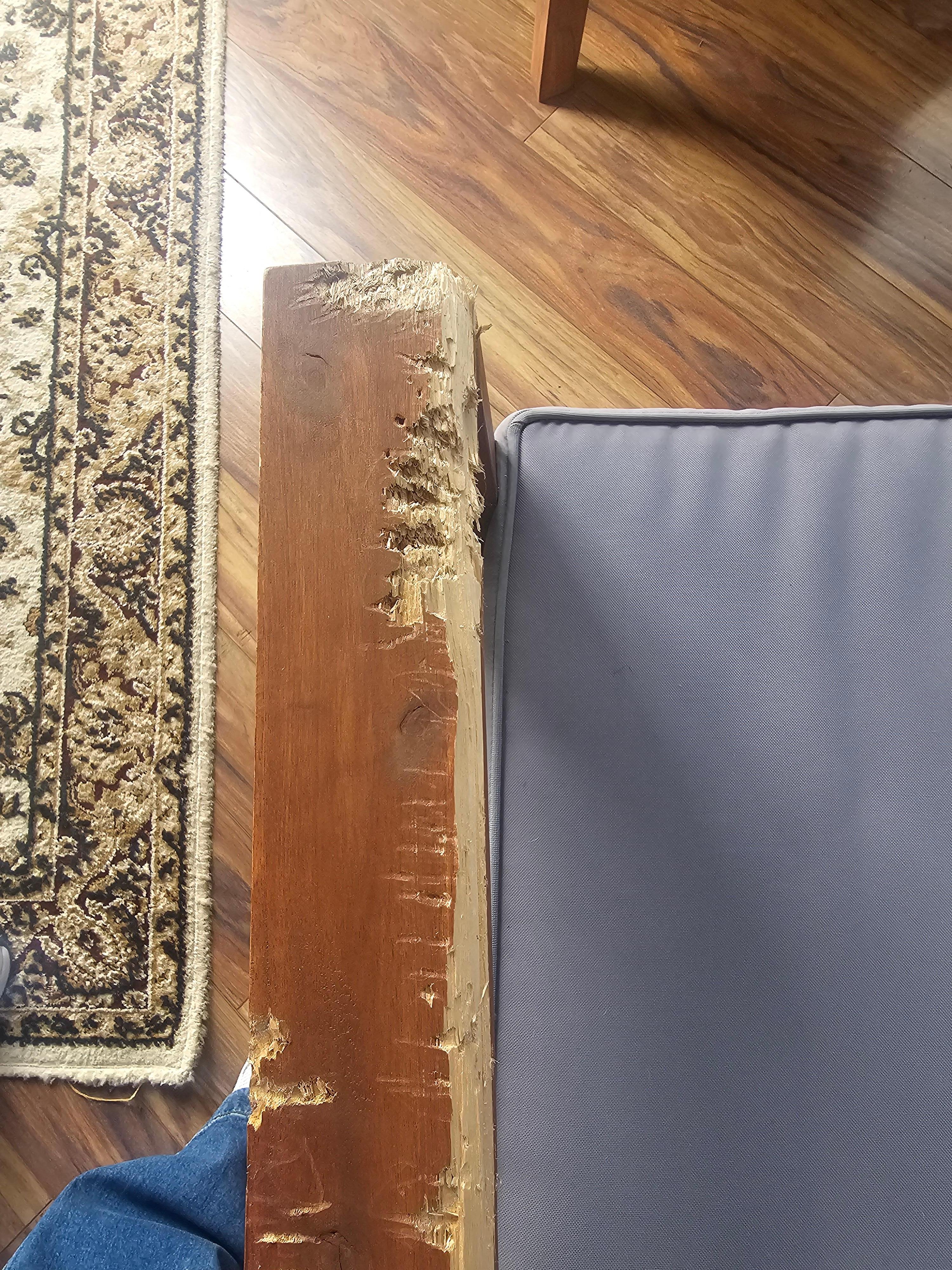 Damaged couch on the porch