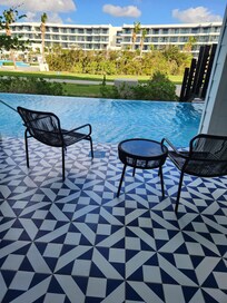 The deck to pool but water was very cold to cold to enjoy.