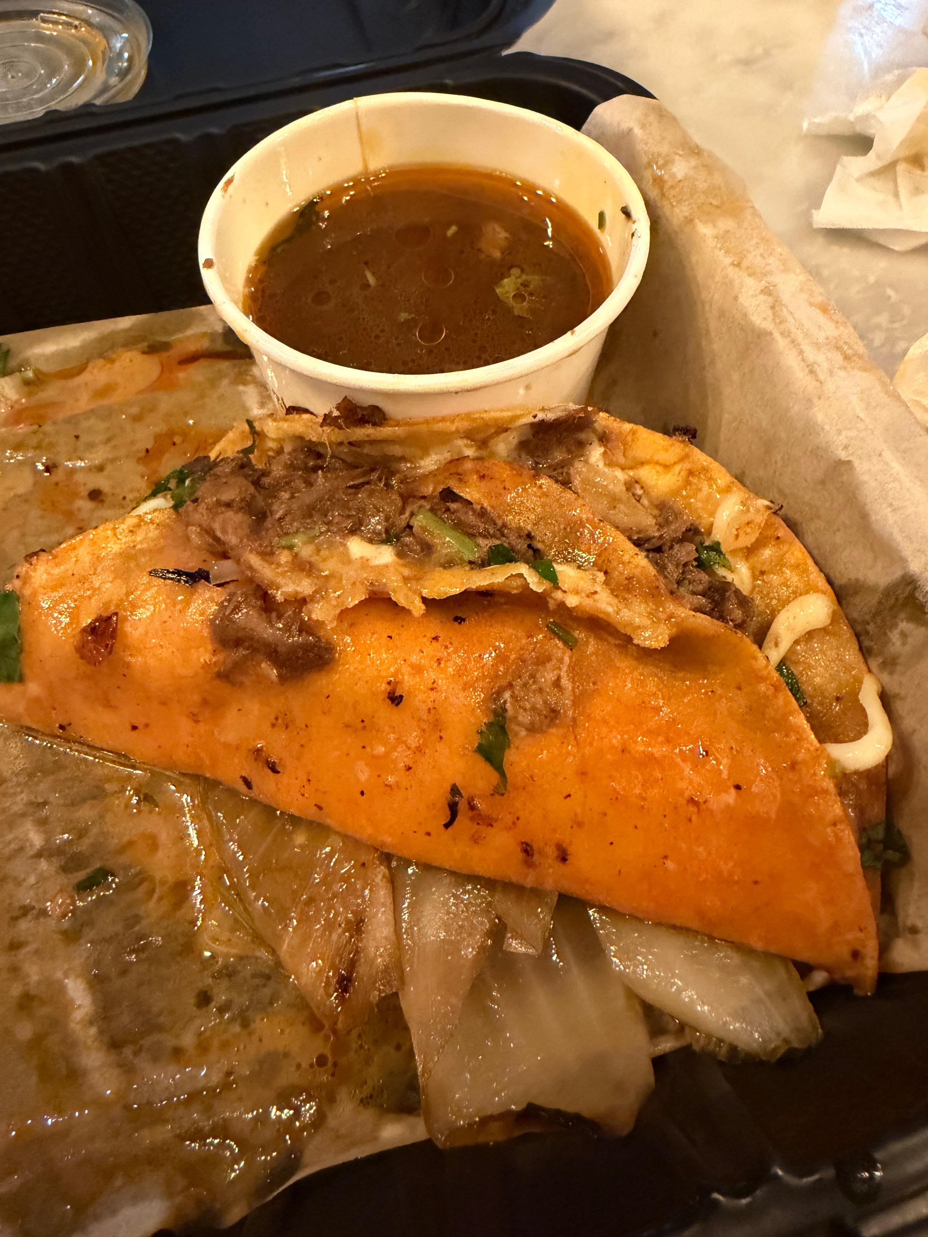 La Taqueria in The Hangar across the street.  Must go!