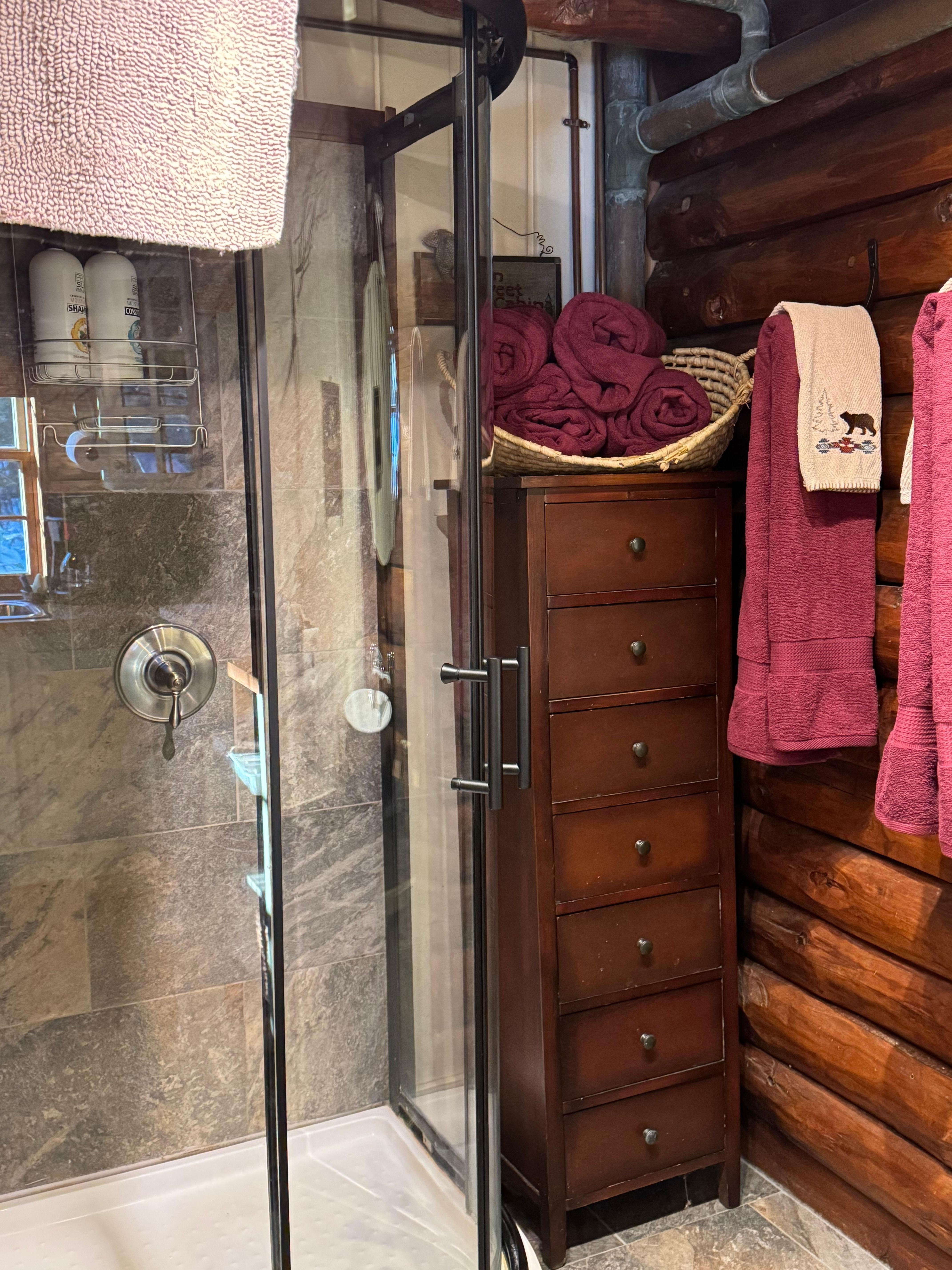 Standup shower stall with hot showers. Toilet has a heated seat!