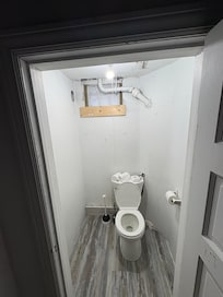 Creepy basement bathroom.