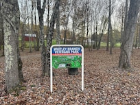 A nice park with a trail and a dog park, a couple miles away.