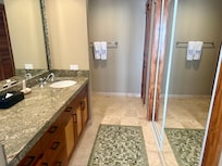 Master bathroom glass shower around the corner