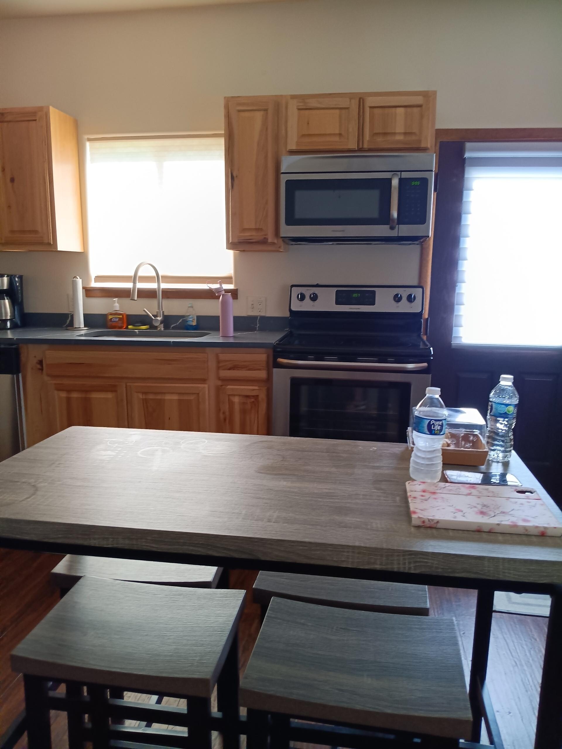 Brand new appliances and plenty of seating.