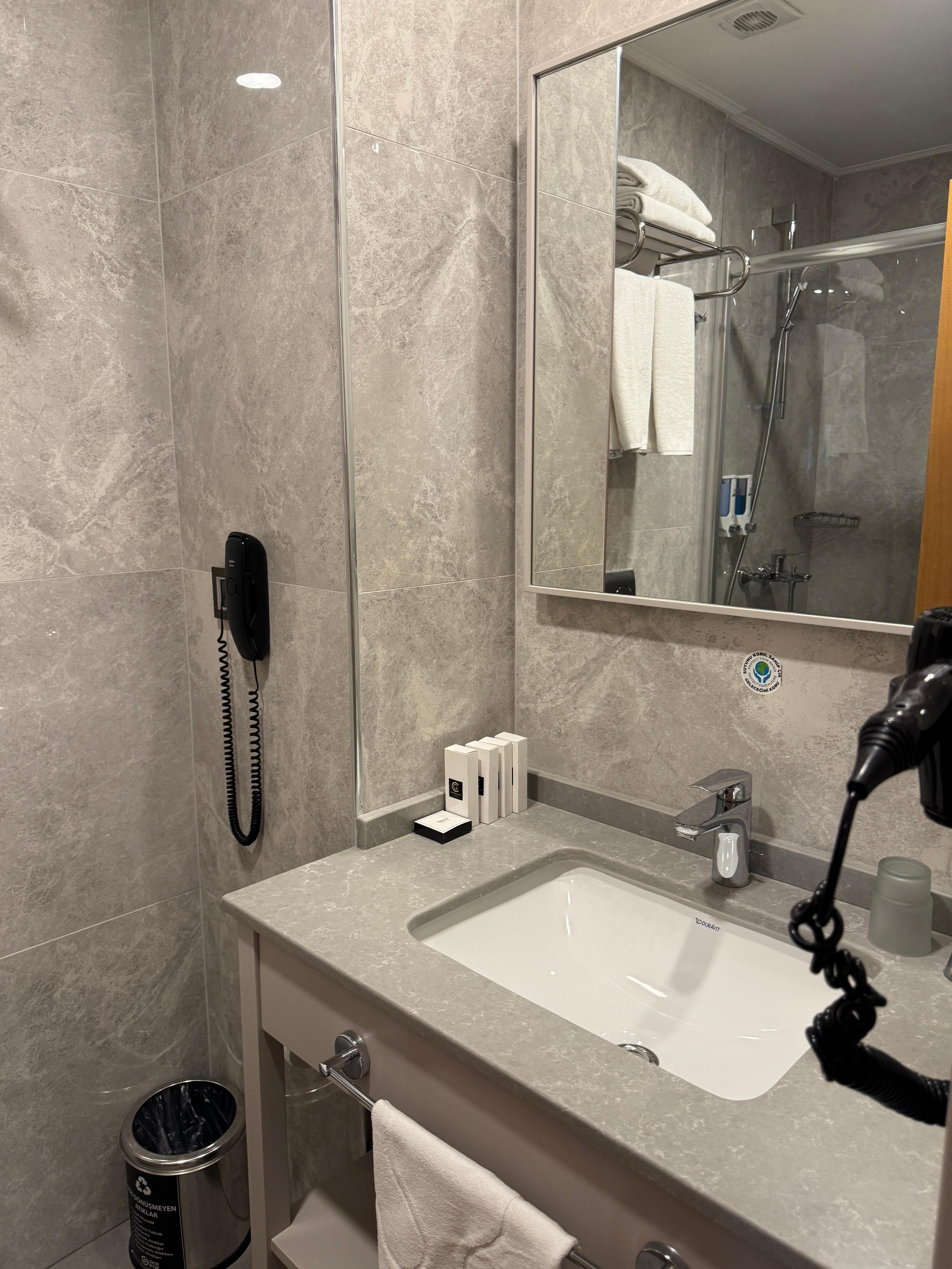 Room 315 bathroom had amenity packs not included in room 211