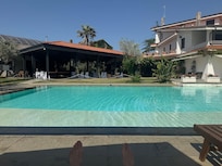 Pool. Plenty of deckchairs and sun loungers.
Many other seating areas around the location