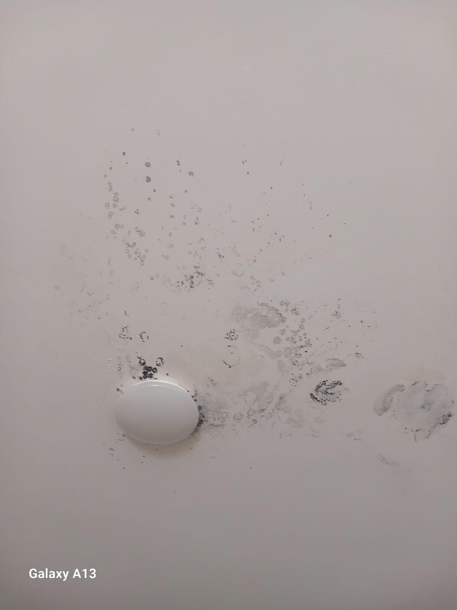 Damp water damage celling and lights not working in smelly games room. 