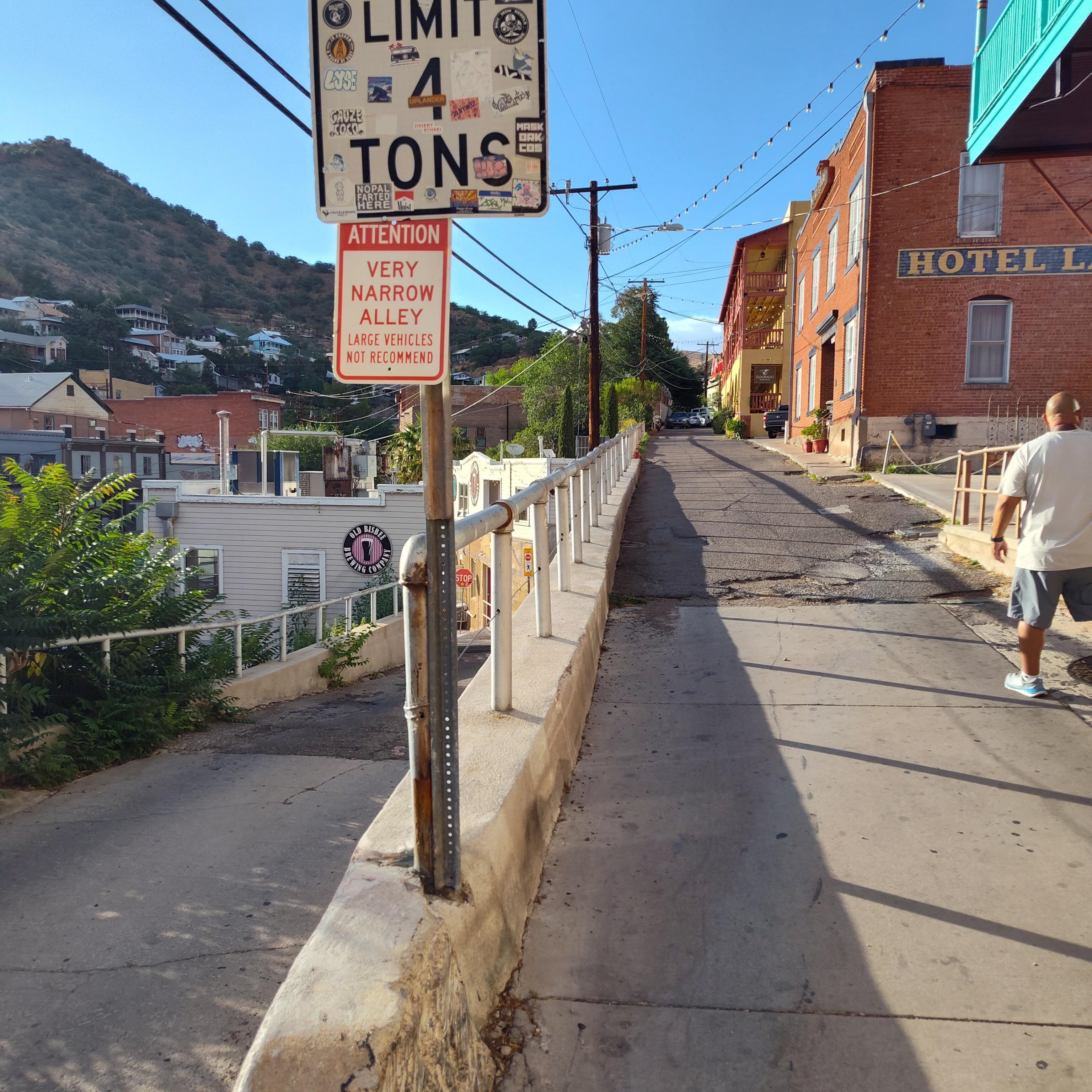 Had to park at the bottom of that hill (left) and climb with luggage up, around and up the second street (right).