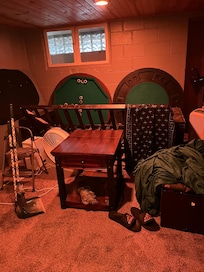 Extra room in basement with items that seem unusable just tossed there