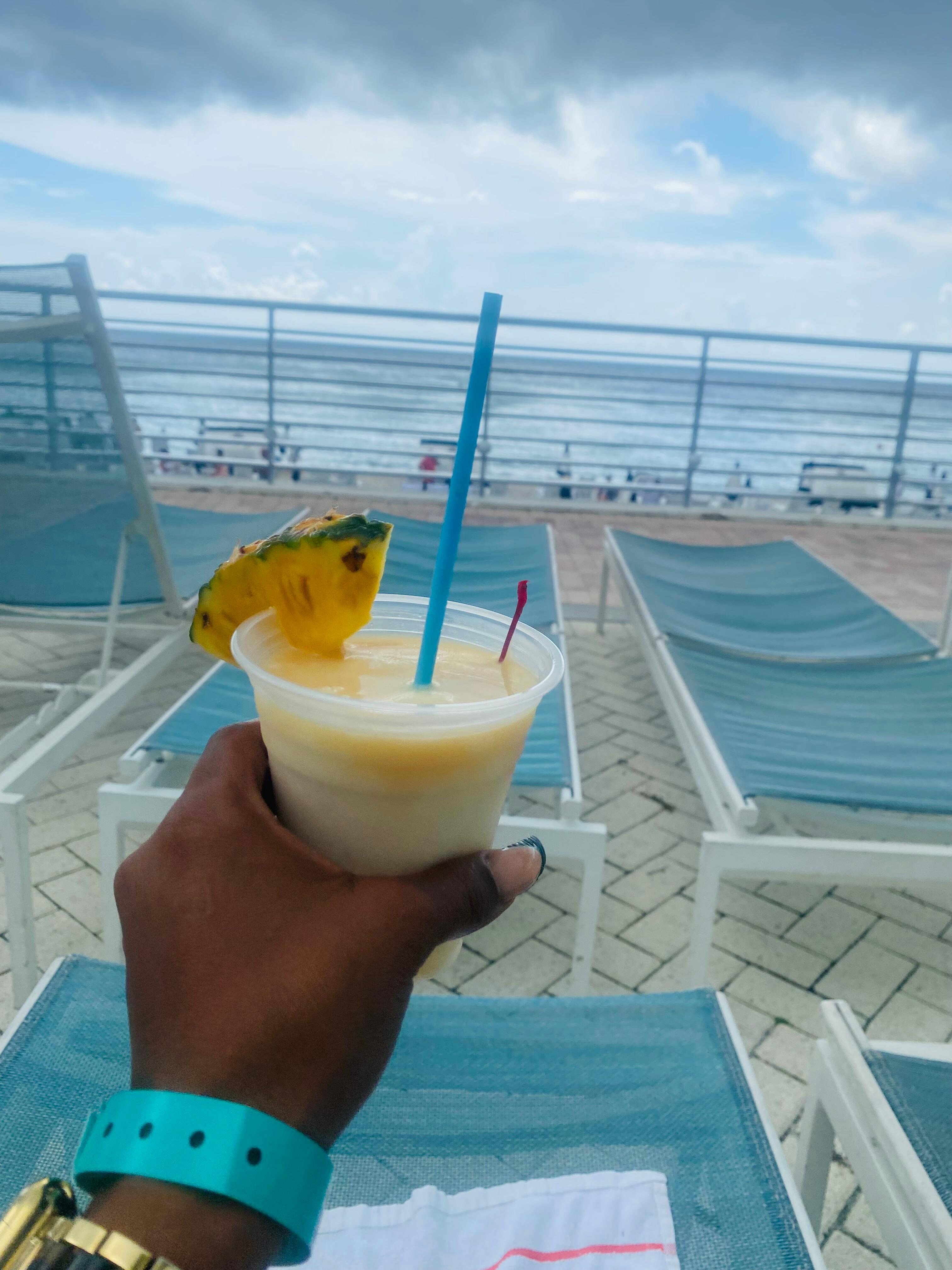 Lounge chairs drink from Playa bar