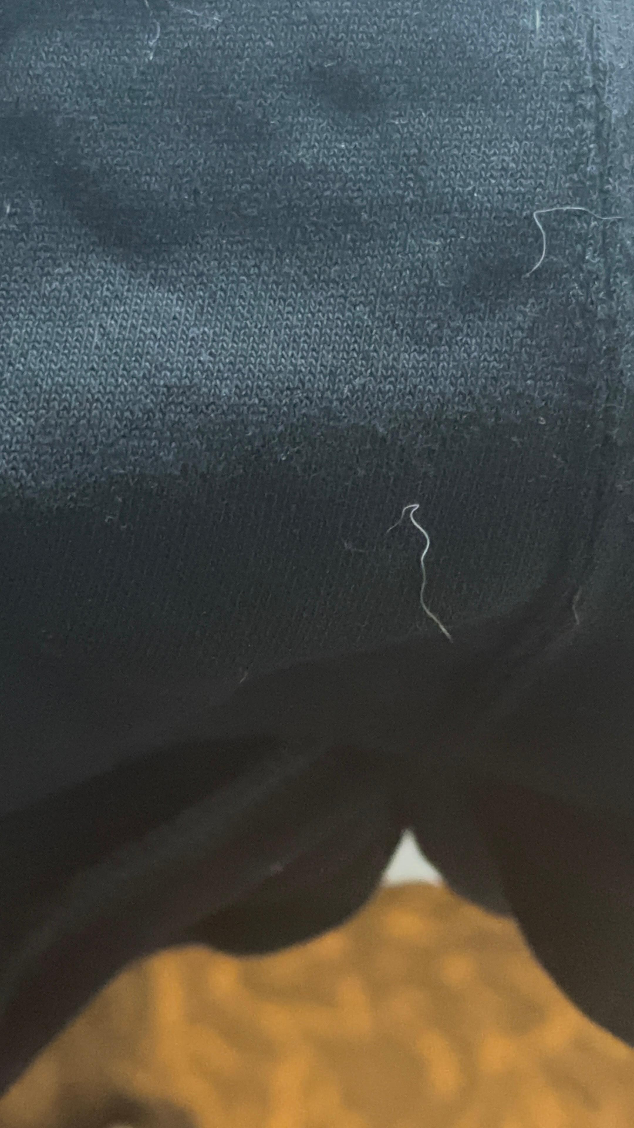 Ruined clothes from dog hair after trying to remove it