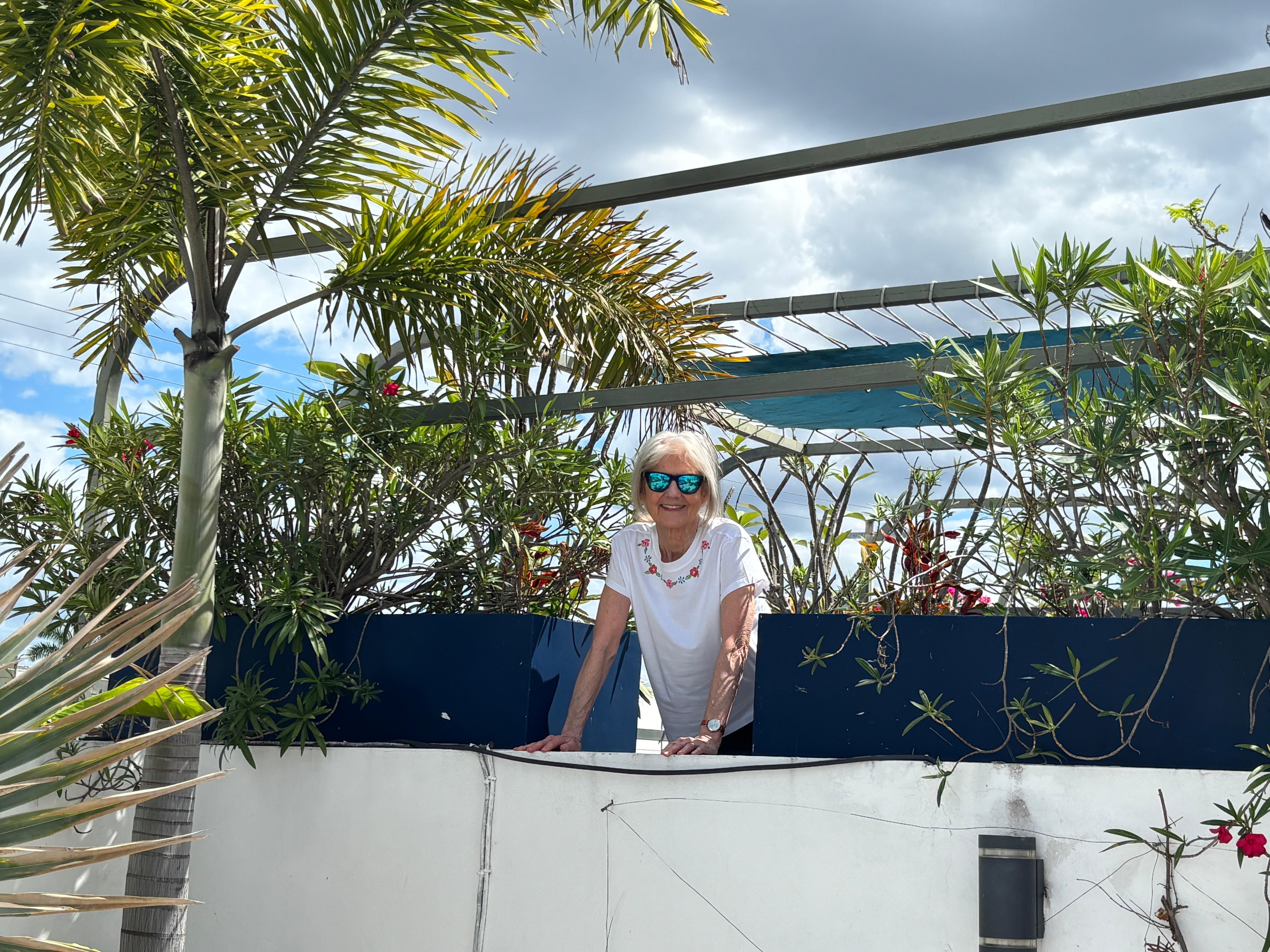 My spouse on the open air roof top patio
