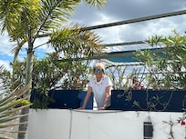 My spouse on the open air roof top patio