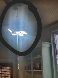 Exposed wiring on kitchen ceiling light/fan