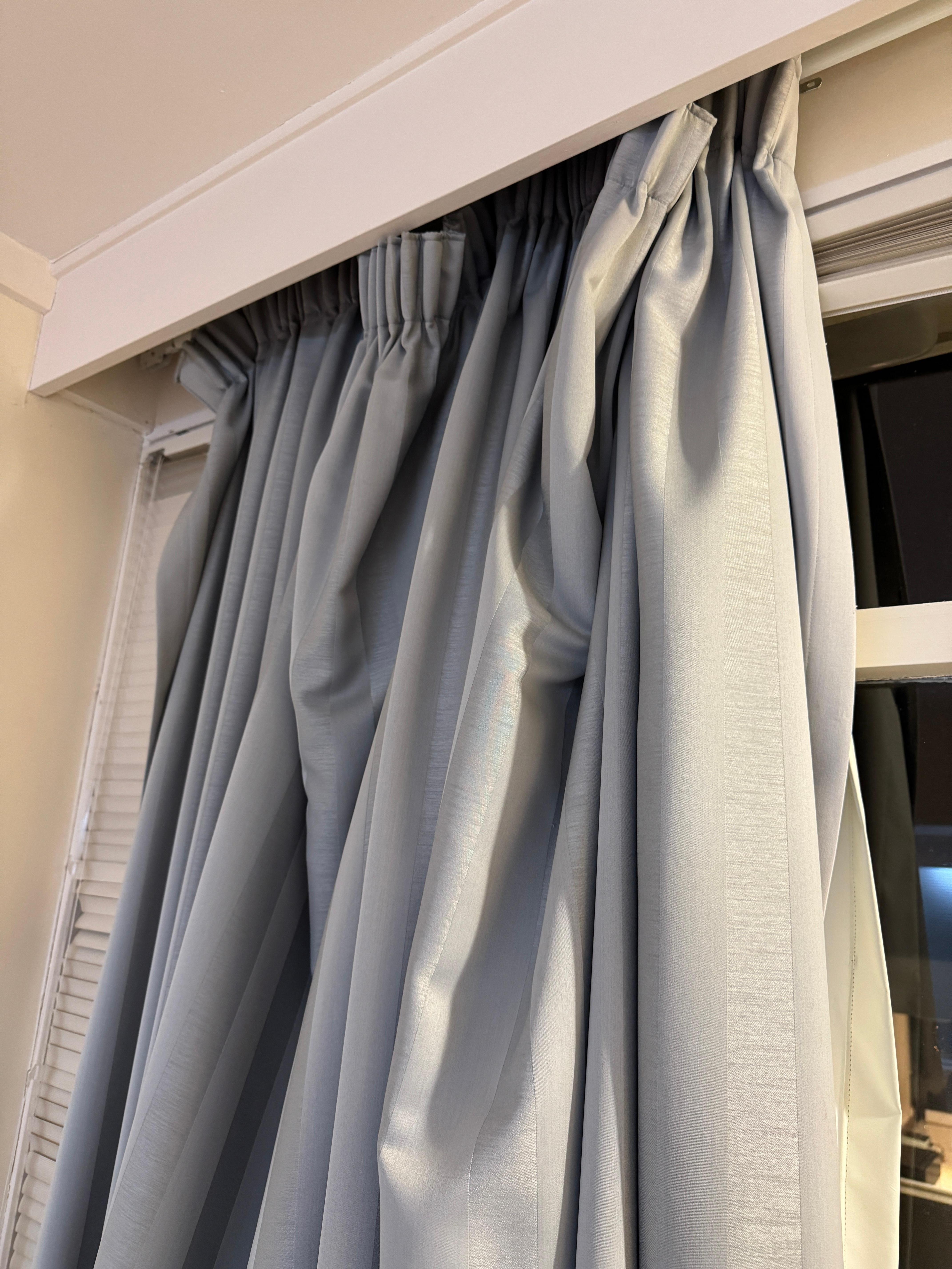 Curtains off the rails and  difficult to close