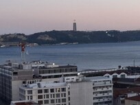 View from the roof. See "Christ the King" or as my son called him, "Jesus of God". My entire review did not take. Such a beautiful hotel. The staff is beyond amazing!