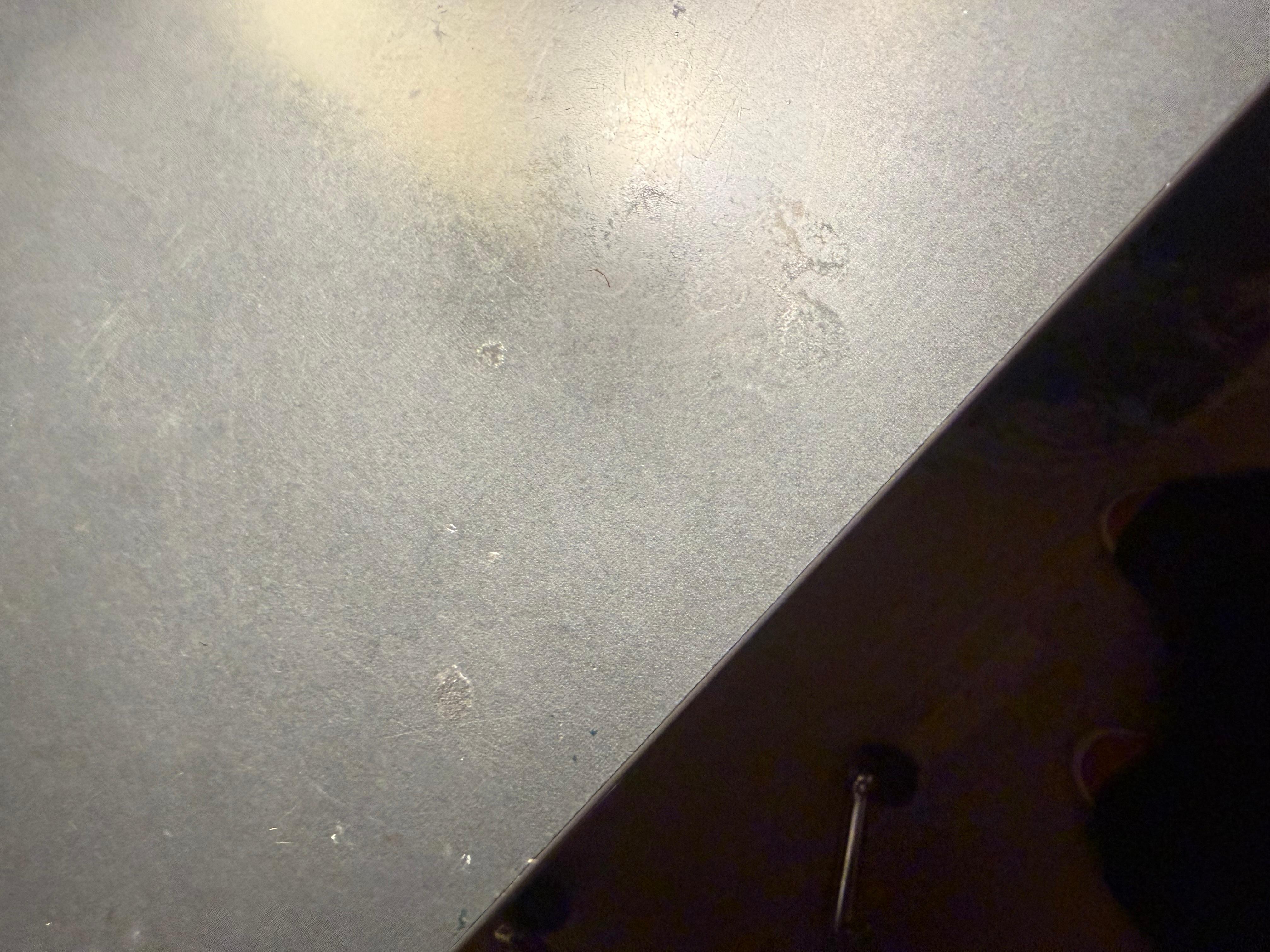 Spilt drink on desk
