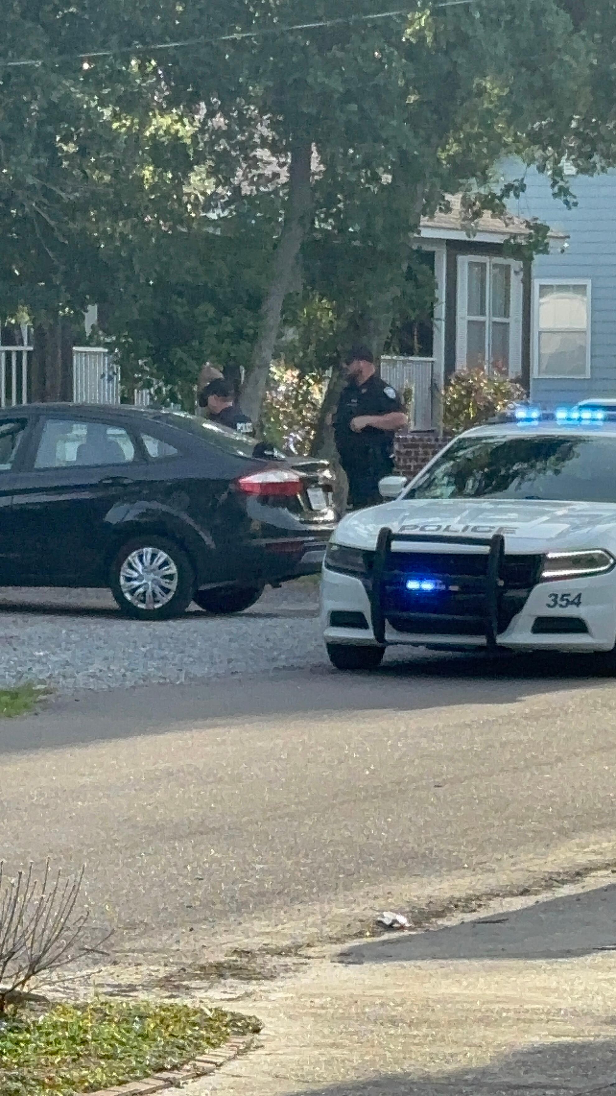 Police across the street with person of interest in handcuffs. Told us to go back in the house for our safety!