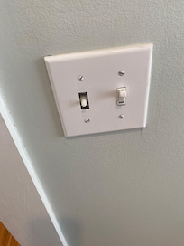Pictures from the company. The knob has been removed, but the knob will pop back on the peg. The knob was intact when I left and only popped off when pushed in hard to use dimmer.